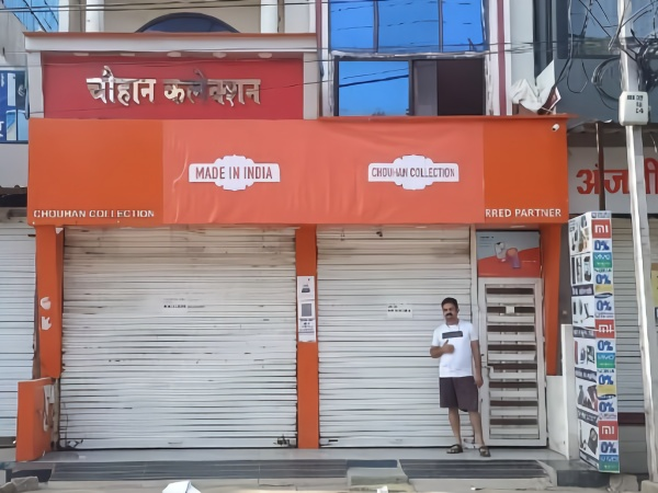 小米部分印度门店logo被覆盖，改为“印度制造”的标语 图片来自CNBC